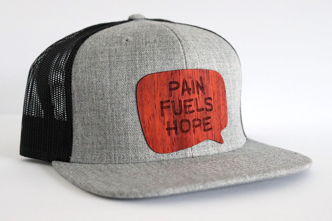 Pain fuels hope hat - Padauk wood