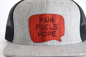 Pain fuels hope hat - Padauk wood