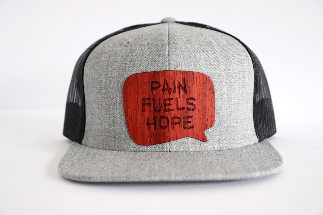 Pain fuels hope hat - Padauk wood